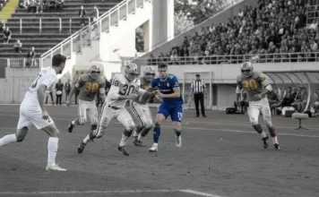 NFL vs AFL teams in a 1960s football rivalry match